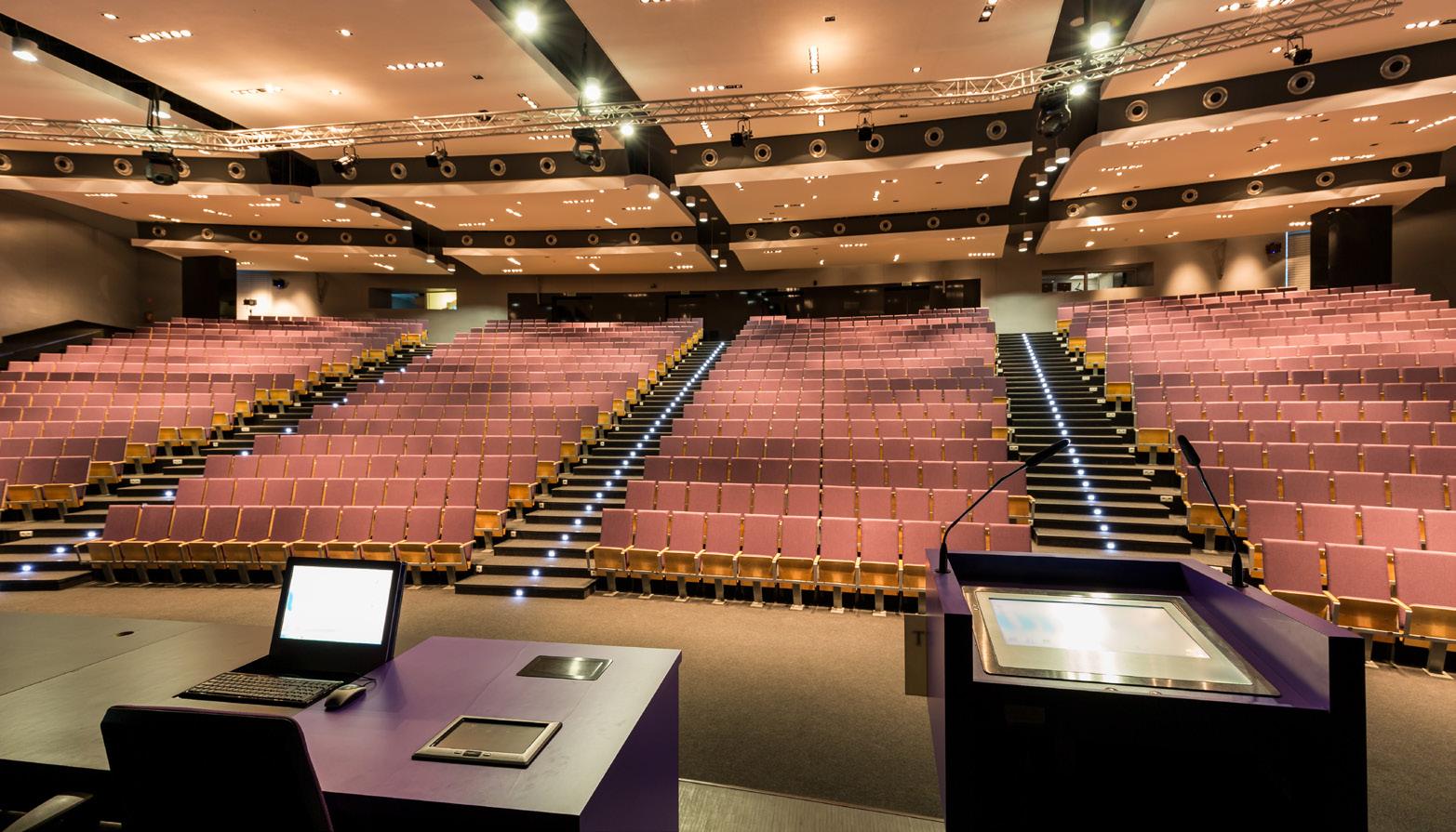 JAK GRAD Modern Auditorium - Professional Theater with Tiered Seating and Advanced Audio Visual Systems